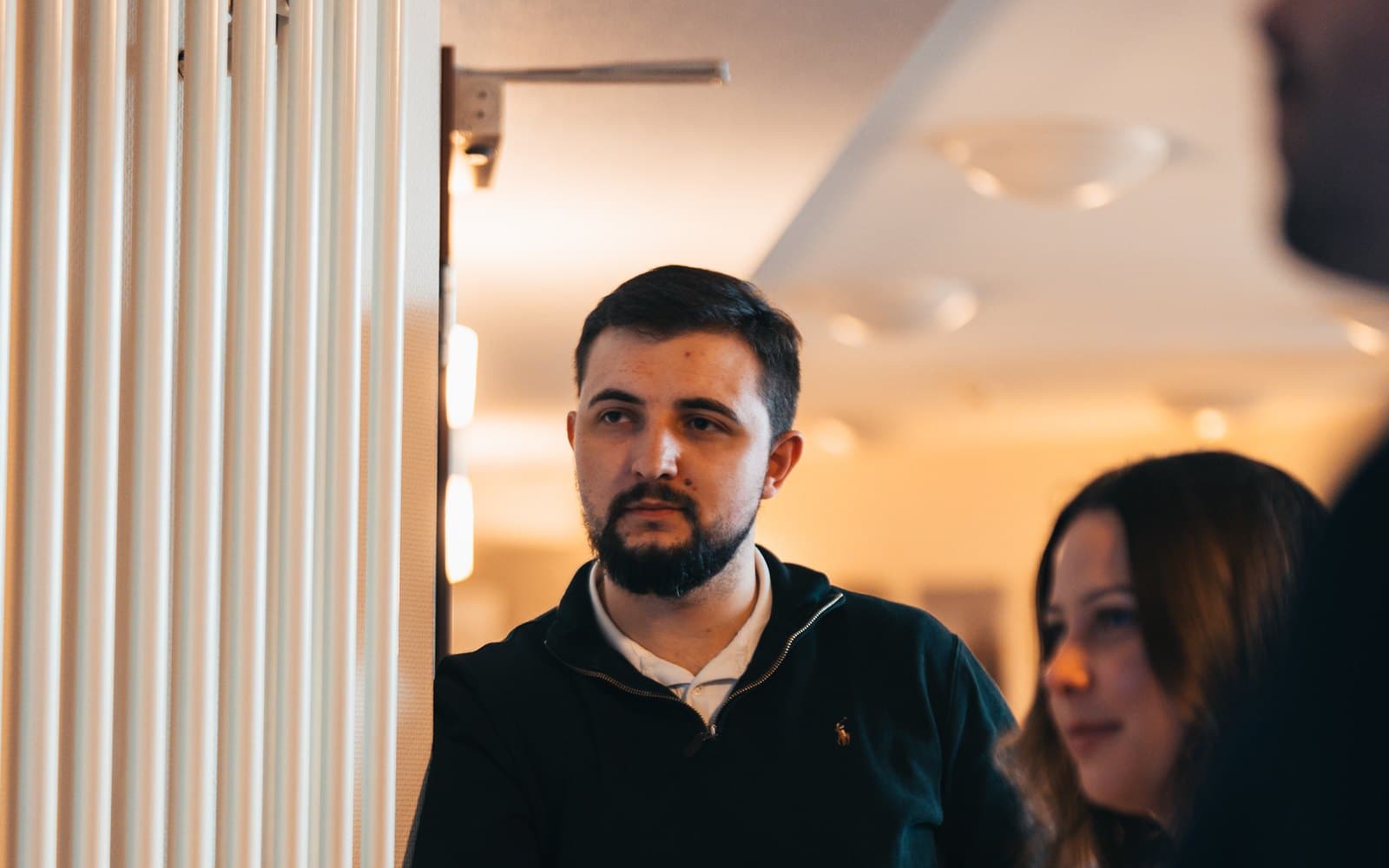 Onboarding-Workshop: Egor Pimkin und Evelina Rudenko im Gespräch mit einem Kunden